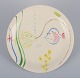 Stig Lindberg for Gustavsberg. "Löja" plate. Hand-painted with a fish motif. 
Satirical illustration with Swedish text.