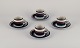 Anja Jaatinen-Winquist for Arabia, Finland. A set of four "Kaira" coffee cups 
with saucers.