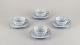 Gefle, Sweden, a set of four "Grand" Art Deco teacups with saucers. Light blue 
faience with gold trim.