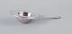 Rare and early Georg Jensen Pyramid tea strainer in sterling silver.
Art Deco.