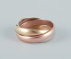Cartier 
“Trinity” ring 
af 18 karat 
guld, hvid- og 
rosa guld.
