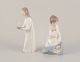 Lladro, Spain. Two porcelain figurines. Girl with a nightstand lamp and an angel 
figurine with a sleeping child.