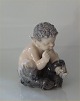 Royal Copenhagen figurine 1712 Faun with snake