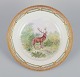 Royal Copenhagen Fauna Danica dinner plate with a motif of a deer in a 
landscape.