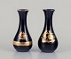 Limoges, France. Two porcelain vases decorated with 22-karat gold leaf and 
beautiful royal blue glaze. Scène galante.