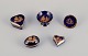 Limoges, France. Five pieces of miniature porcelain decorated with 22-karat gold 
leaf and beautiful royal blue glaze.