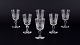 A set of six mouth-blown French port wine glasses in crystal glass.