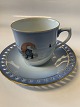 Bing & Grøndahl Christmas set by Harald Wiberg, coffee cup with saucer.Deck no. 3505/305.Diameter of the cup is 7.4 cm.SOLD