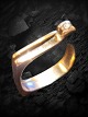 Balle & 
Lillelund - 
Brocante & 
Design 
præsenterer: 
Ole 
Lynggaard ring 
i 18 karat guld 
med brilliant. 
Str 51.