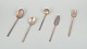 Sigvard Bernadotte "Scanline" brass flatware.
Five pieces of serving utensils.