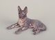 Dahl Jensen, porcelain figurine of a reclining German Shepherd.
