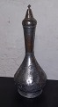 Indisk flaske i metal med prop