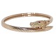 Georg Jensen 
18 carat gold bracelet with two rubies and shaped 
as a horse