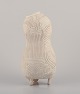 L'Art 
præsenterer: 

Christina 
Muff, Dansk 
samtidskunstner, 
født 1971.
Cremehvid 
organisk vase 
på tre fødder. 
...