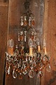 Old French prism chandelier with lots of clear and amber colored glass prisms...