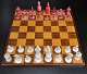 Schachspiel mit 
Figuren in den 
Beinen, 19. 
Jahrhundert.