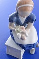 Royal 
Copenhagen 
Figur 473 
Mädchen mit 
Blumen