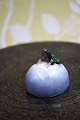 Royal Copenhagen porcelain figurine of a small frog sitting on a stone. 
RC# 507...