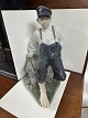 Royal 
Copenhagen 
Figuren, Junge 
auf Stein Nr. 
1659 1 ...