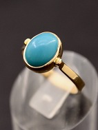 14 carat gold ring with cabochon cut turquoise