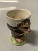 Egg cup 
Faience.
Motif: Monkey.