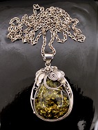 Sterling silver vintage pendant with amber
