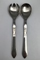 Danam Antik 
præsenterer: 
Georg 
Jensen Sterling 
Sølv / Stål 
Antik Salatsæt 
No. 132