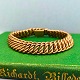 Antik 
Damgaard-
Lauritsen 
præsenterer: 

Armbånd i 
14 kt. guld