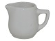 Antik K 
præsenterer: 

Royal 
Copenhagen
Miniature hvid 
flødekande i 
jernporcelæn 
4,2 cm.