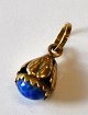 Pegasus – Kunst 
- Antik - 
Design 
presents: 
Small 18th 
carat gold 
pendant, 20th 
century.