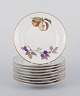 L'Art 
præsenterer: 

Royal 
Worcester, 
England. 
Et sæt på ni 
Evesham 
porcelænstallerkener 
dekoreret med 
frugter ...