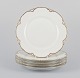 L'Art 
præsenterer: 

Et sæt på 
fem "Haviland" 
middagstallerkener 
af porcelæn.