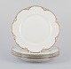 L'Art 
præsenterer: 

Et sæt på 
fire Haviland 
middagstallerkener 
af porcelæn.