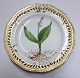 Lundin Antique 
præsenterer: 
Royal 
Copenhagen, 
Flora Danica. 
Frokost 
tallerken med 
gennemskåret 
bort. Design 
...