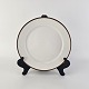 Kinnerup Antik 
& Porcelæn 
præsenterer: 
RC
Frokosttallerken
Brun 
Domino
Nr 14923