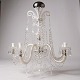 Osted Antik & 
Design 
præsenterer: 
Prismelysekrone 
- Fem glasarme 
- Elektrisk - 
ca. 1890
Flot stand
