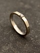 Middelfart 
Antik 
præsenterer: 
14 karat 
hvidguld ring 
med diamant
