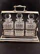 Tantalus in 
silver-plated 
holder with 3 
cut crystal ...