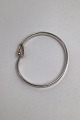 Danam Antik 
præsenterer: 
Georg 
Jensen Sterling 
Sølv Torun 
Armring No. 204 
(18 K Guld)