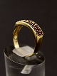 Middelfart 
Antik 
præsenterer: 
8 karat 
guld ring med 
talrige 
granater