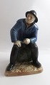 Lundin Antique 
præsenterer: 

Royal 
Copenhagen. 
Porcelænsfigur. 
Den gamle 
fisker fra 
Skagen. Model 
489. (1 ...