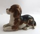 Lundin Antique 
præsenterer: 

Royal 
Copenhagen. 
Porcelænsfigur. 
Liggende 
Beagle. Model 
565 (2565). 
Længde 16 cm. 
...