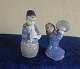 Antikkram 
præsenterer: 

Royal 
Copenhagen 
figurer nr. 
3677 Pige med 
grydelåg og nr. 
3689, Dreng med 
horn