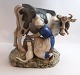Lundin Antique 
præsenterer: 

Bing & 
Grøndahl. 
Porcelænsfigur. 
Malkepige. 
Model 2017. 
Højde 19 cm. (1 
sortering).