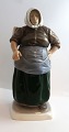 Lundin Antique 
præsenterer: 

Bing & 
Grøndahl. 
Porcelænsfigur. 
Skovshovedkone. 
Model 1702. 
Højde 28,5 cm. 
(1 ...