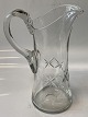 Antik Huset 
præsenterer: 

Holmegaard, 
Høj slank glas 
vandkande
Mål 22,5 x 9,5 
cm.