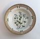 Lundin Antique 
præsenterer: 

Royal 
Copenhagen. 
Flora Danica. 
Lille dyb 
portionsskål. 
Model 601 
(3590). 
Diameter ...