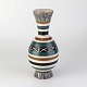 Kinnerup Antik 
& Porcelæn 
præsenterer: 

Aksini 
vase
18 cm
