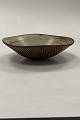 Danam Antik 
præsenterer: 

Royal 
Copenhagen 
Stentøjsskål af 
Axel Salto No. 
20727