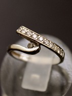 14 carat white gold ring size 48 with several diamonds